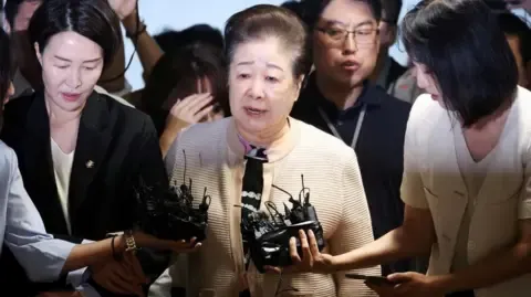 Disputed Church Leader Dismisses Bribery Accusations Against Ex-South Korea President's Wife